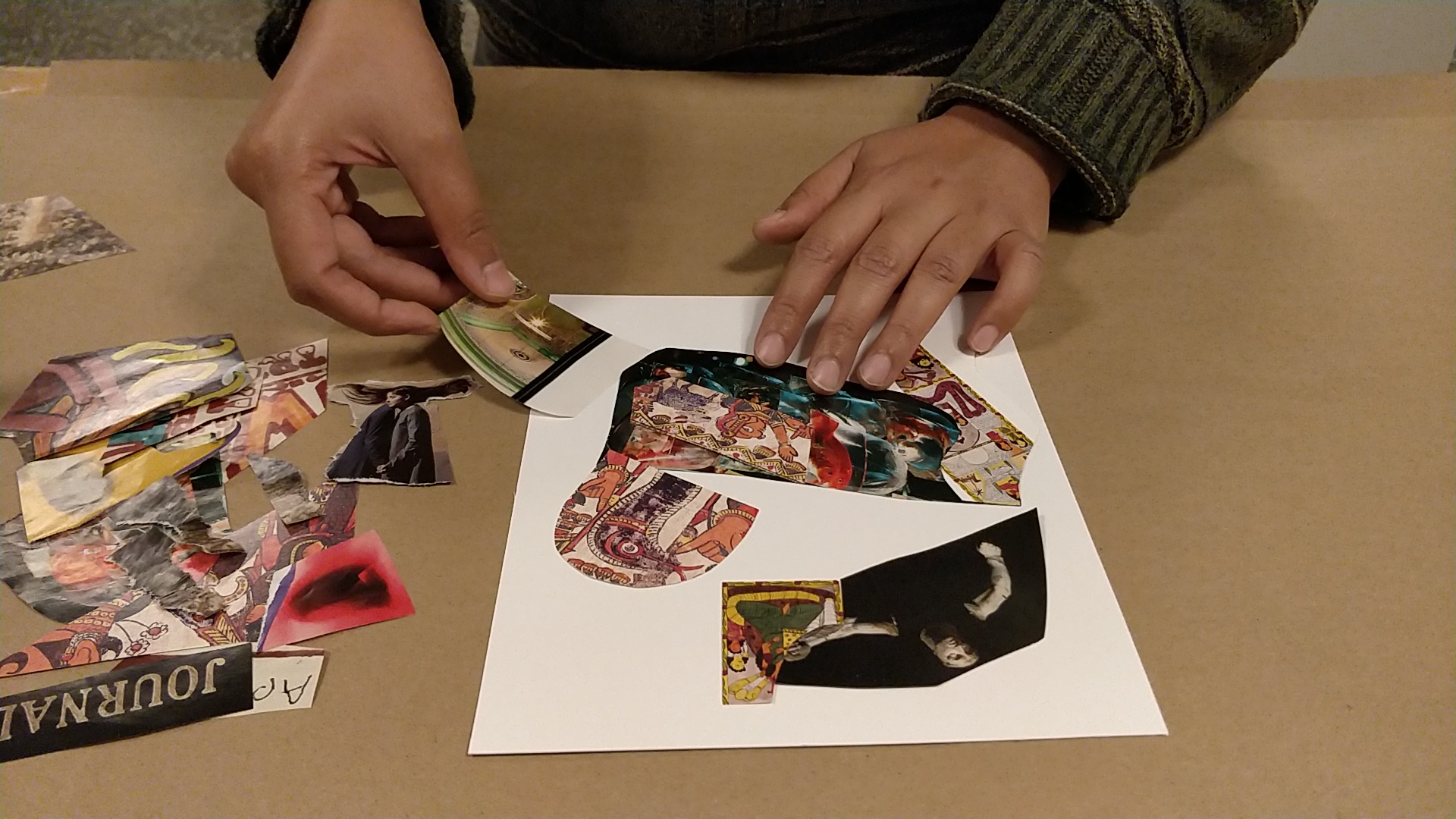 person doing collage artwork