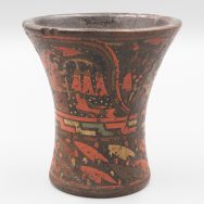 Clay beaker with multicolored lacquer design; design appears to be narrative not totally decorative.